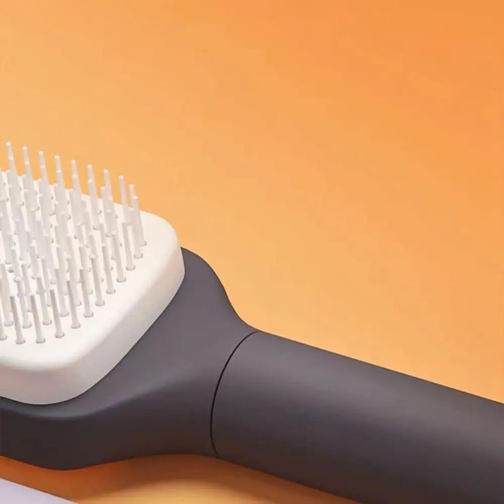 4 In 1 Self Cleaning Hair Brush .