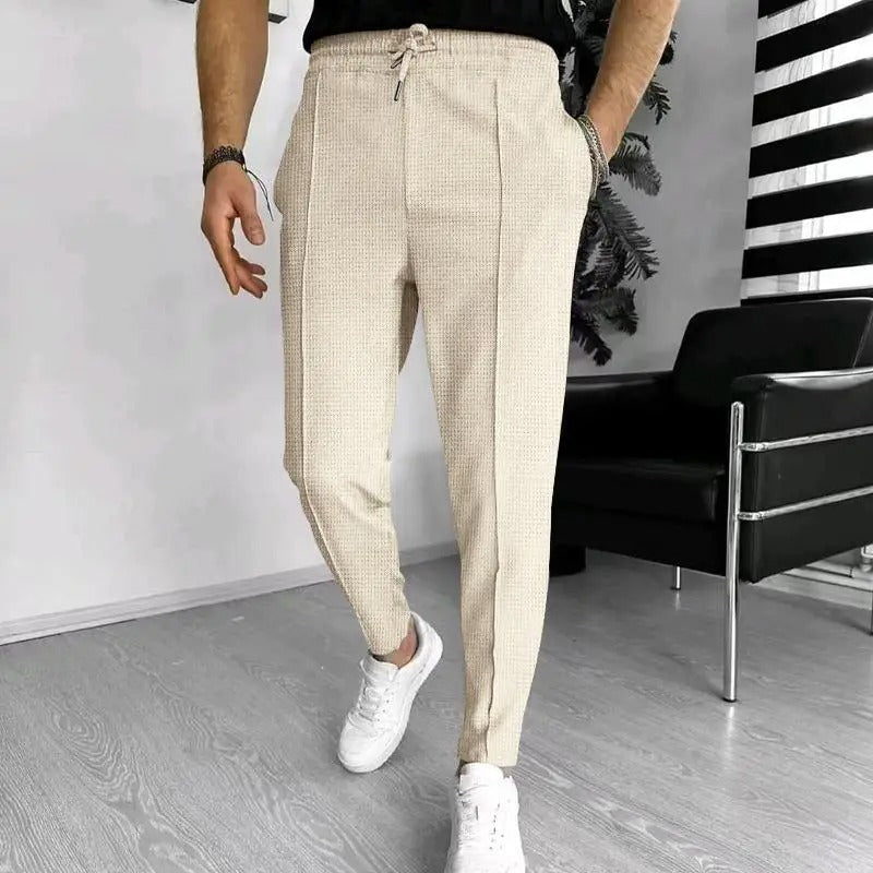 Calça esportiva com cordão xadrez waffle